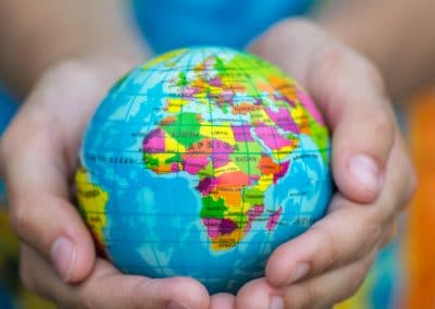 child holding a globe